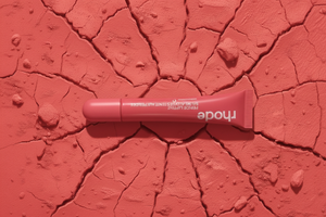 Rhode Peptide Lip Tint Neon Coral — Rotated Orientation